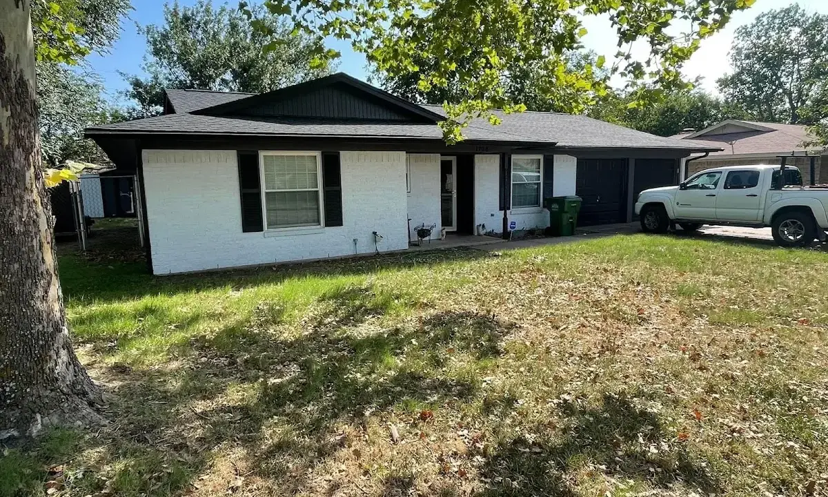 Professional roofing crew working on a residential roof in Highland Heights